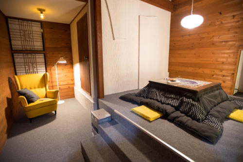 Reading corner with a traditional Kotatsu heating table to keep your feet warm